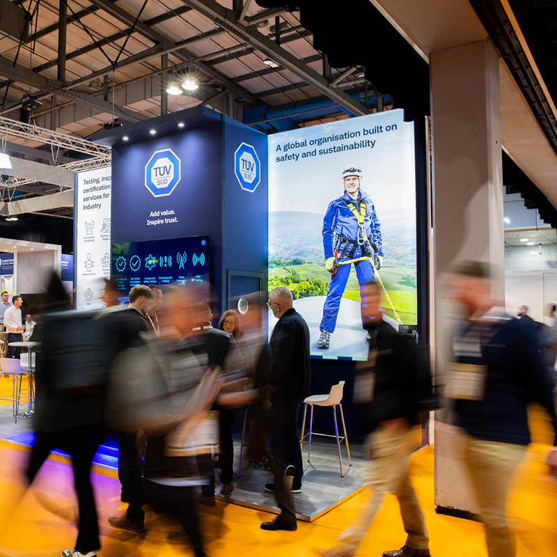People walking around a trade exhibition. 